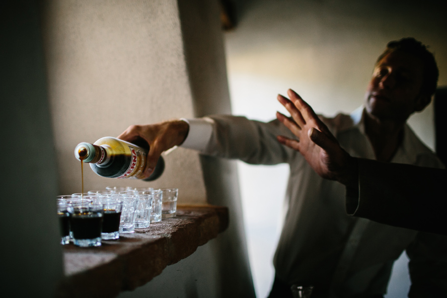 Room and best man having a drink before wedding in Tuscany