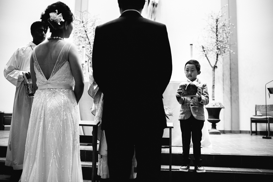 little boy holding rings during cinese wedding ceremony in toronto