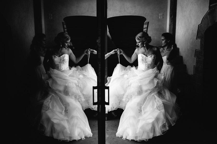 mirror reflection of a bride getting ready in Tuscany