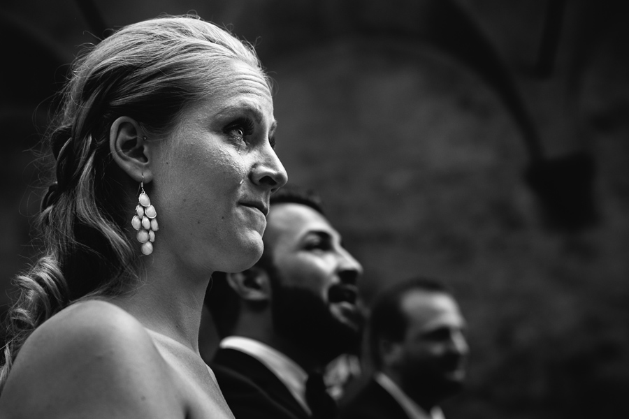 Sister of the bride crying with tears during ceremony