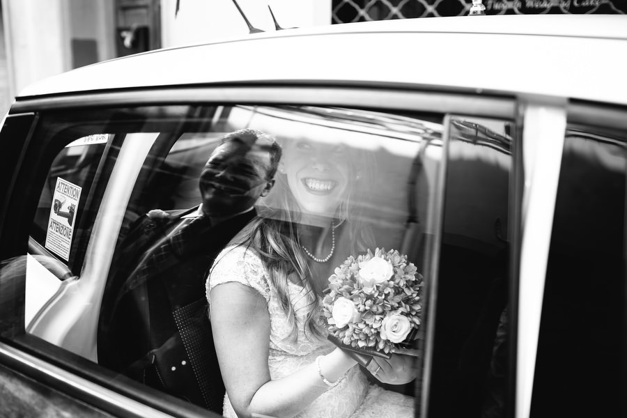 bride arriving by car for her wedding ceremony in florence