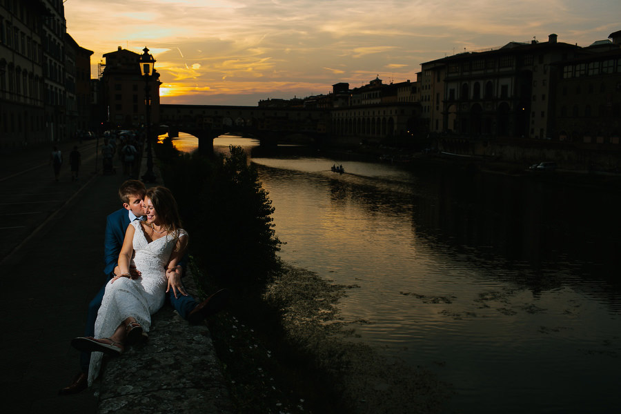 sunset wedding photo in florence with ponte vecchio old bridge i