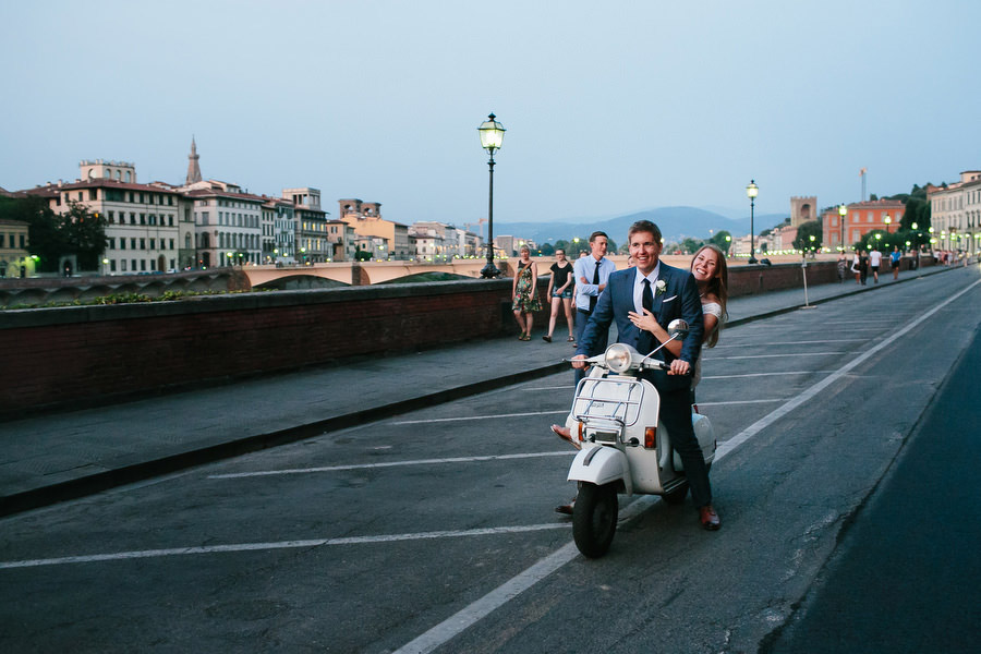 bride and groom on a vespa in florence