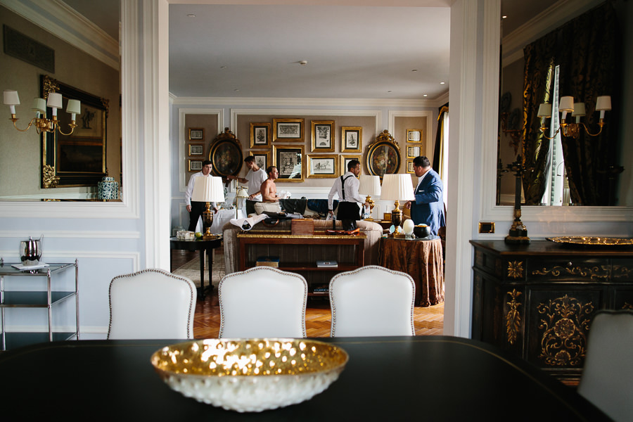 Groom getting ready at St. Regis Hotel Florence