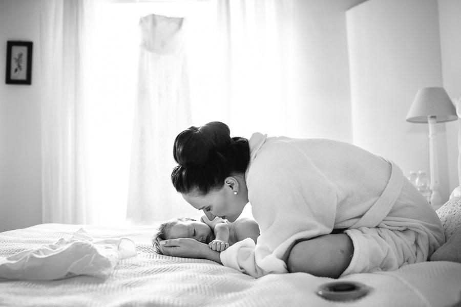 bride watching her baby before wedding