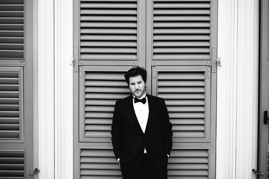 groom portrait before wedding in portofino