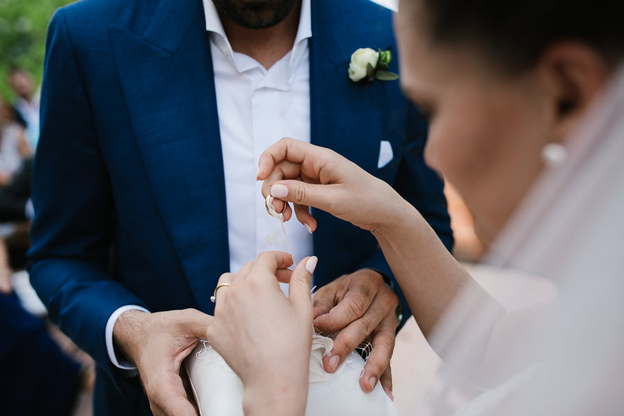 exchanging the rings during wedding ceremony
