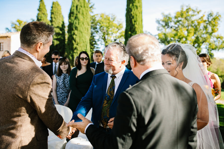 groom handshake father in law wedding tuscany