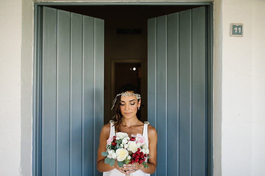 bride with bouquet at wedding in apulia