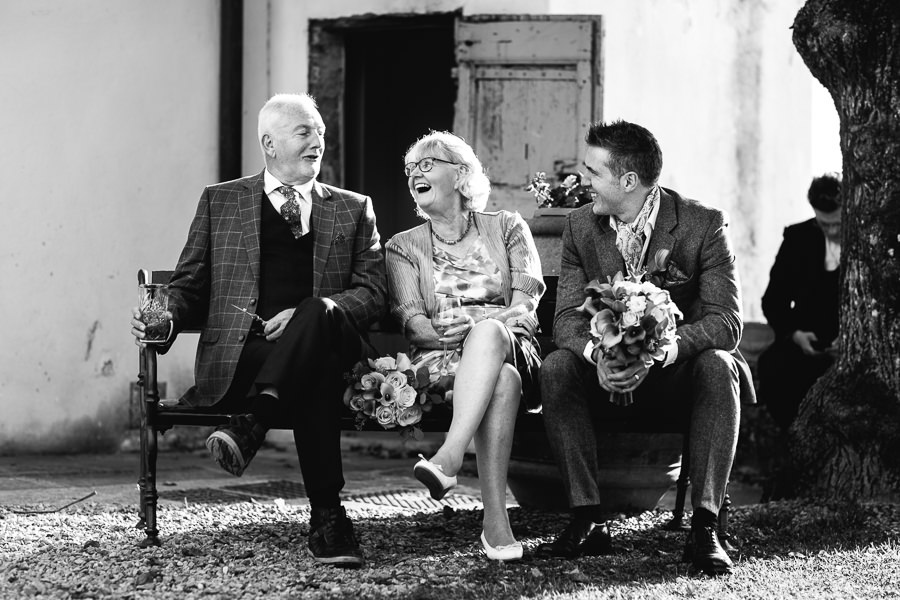 candid moment with groom and his parents