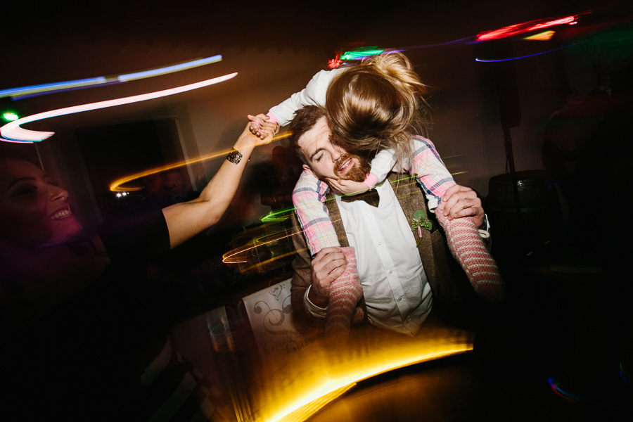 girl dancing with her father