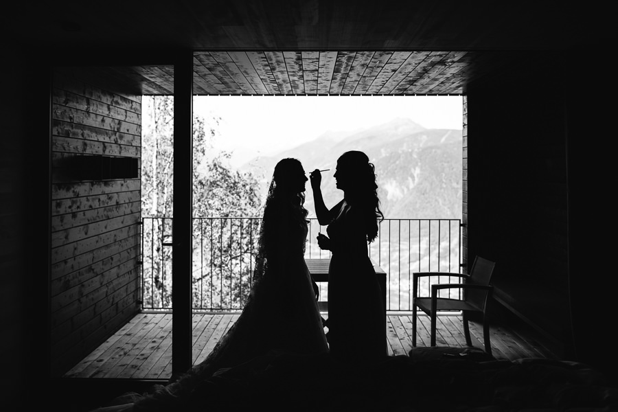 bride makeup in fron of mountains in south tyrol