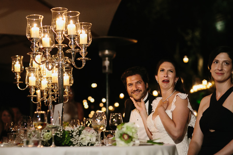 funny face of the bride during wedding dinner