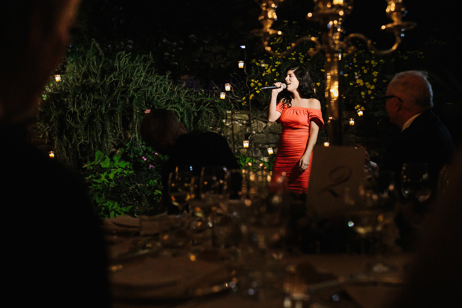 guests singing during wedding reception