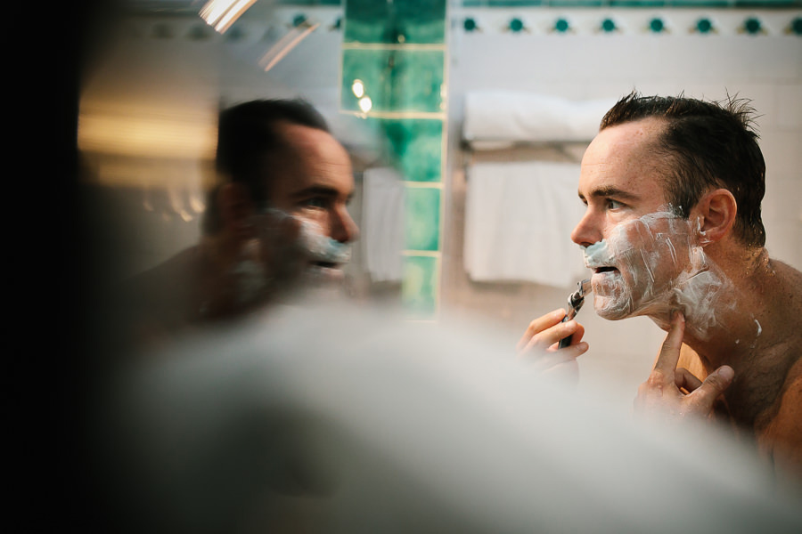 Groom shaving before Villa Cimbrone Wedding