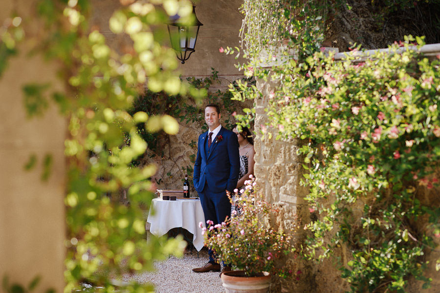 Bride walking down the aisle at Borgo Santo Pietro elopement wed