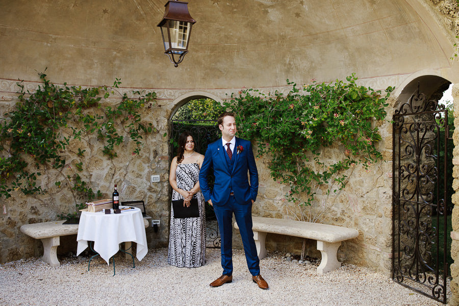 Bride walking down the aisle at Borgo Santo Pietro elopement wed