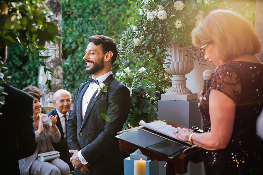 Romantic same-sex wedding ceremony tea room villa cimbrone photo