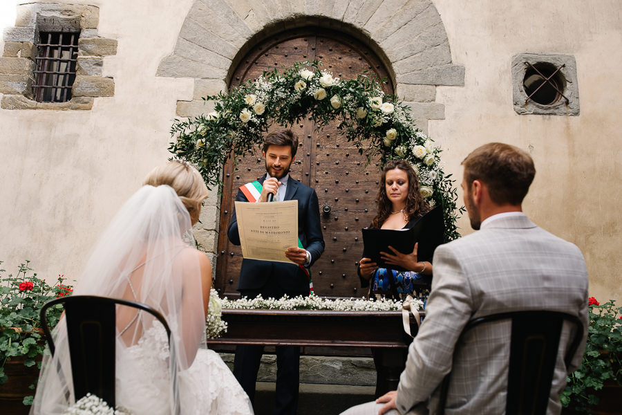 bride and groom wedding ceremony castello del trebbio