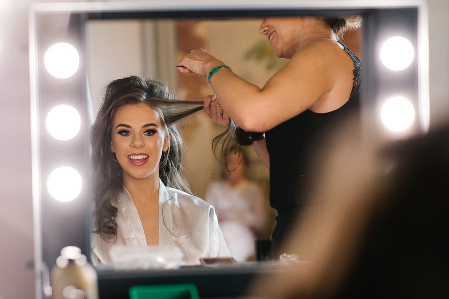 Bride makeup in front of a mirror