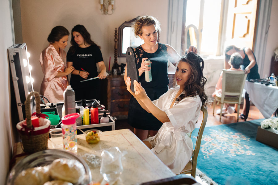 Bride makeup in front of a mirror