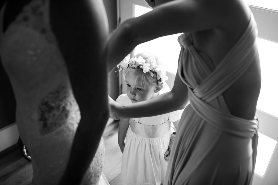 bride putting on her dress at villa cora in florence