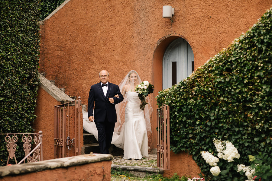 bride getting ready for wedding on lake como