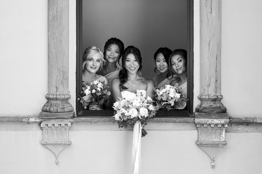 portrait photo of bride and her bridesmaids
