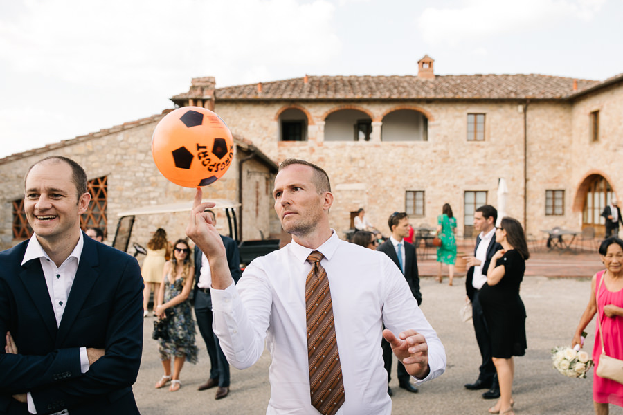 hugs and kisses during wedding at castello di meleto