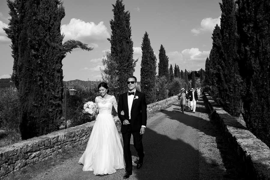 hugs and kisses during wedding at castello di meleto